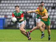 18 November 2023; Conor McStay of Ballina Stephenites in action against Corofin captain Dylan McHugh during the AIB Connacht GAA Football Senior Club Championship Semi-Final match between Corofin, Galway, and Ballina Stephenites, Mayo, at Pearse Stadium, Galway. Photo by Ray Ryan/Sportsfile