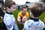 18 November 2023; Gary Sice of Corofin signs autographs for young supporters after the AIB Connacht GAA Football Senior Club Championship Semi-Final match between Corofin, Galway, and Ballina Stephenites, Mayo, at Pearse Stadium, Galway. Photo by Ray Ryan/Sportsfile