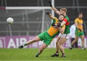 18 November 2023; Conor Cunningham of Corofin in action against Mark Birrane of Ballina Stephenites during the AIB Connacht GAA Football Senior Club Championship Semi-Final match between Corofin, Galway, and Ballina Stephenites, Mayo, at Pearse Stadium, Galway. Photo by Ray Ryan/Sportsfile