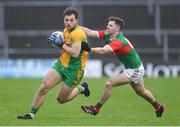 18 November 2023; Liam Silke of Corofin in action against Conor McStay of Ballina Stephenites during the AIB Connacht GAA Football Senior Club Championship Semi-Final match between Corofin, Galway, and Ballina Stephenites, Mayo, at Pearse Stadium, Galway. Photo by Ray Ryan/Sportsfile