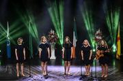18 November 2023; Baile Uí Chumaoil of Westmeath, Aoibhinn Dolan, Bláthnaid Daly, Naomi Fitzpatrick, Clíodhna Daly and Zara Geraghty competing in the Bailéad-Ghrúpa category during the Scór Sinsir 2023 All-Ireland Finals at the INEC Arena in Killarney, Kerry. Photo by Eóin Noonan/Sportsfile