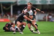 18 November 2023; Francois Venter of Hollywoodbets Sharks tackles John Porch of Connacht during the United Rugby Championship match between Hollywoodbets Sharks and Connacht at Holywoodbets Kings Park in Durban, South Africa. Photo by Shaun Roy/Sportsfile