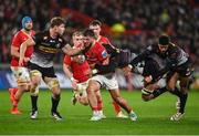 18 November 2023; Alex Nankivell of Munster is tackled by Sacha Feinberg-Mngomezulu, right, and Ruben van Heerden of DHL Stormers during the United Rugby Championship match between Munster and DHL Stormers at Thomond Park in Limerick. Photo by David Fitzgerald/Sportsfile