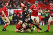 18 November 2023; Ben-Jason Dixon of DHL Stormers is tackled by Jeremy Loughman of Munster during the United Rugby Championship match between Munster and DHL Stormers at Thomond Park in Limerick. Photo by David Fitzgerald/Sportsfile