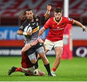 18 November 2023; Clayton Blommetjies of DHL Stormers is tackled by Josh Wycherley of Munster during the United Rugby Championship match between Munster and DHL Stormers at Thomond Park in Limerick. Photo by David Fitzgerald/Sportsfile