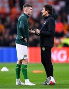 18 November 2023; Evan Ferguson of Republic of Ireland, left, in conversation with Republic of Ireland coach Keith Andrews before the UEFA EURO 2024 Championship qualifying group B match between Netherlands and Republic of Ireland at Johan Cruijff ArenA in Amsterdam, Netherlands. Photo by Stephen McCarthy/Sportsfile