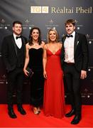 18 November 2023; Cork players Ciara O'Sullivan, left, and Doireann O'Sullivan with Colin Kelly, left, and Ian Maguire upon arrival at the TG4 All-Ireland Ladies Football All Stars Awards banquet, in association with Lidl, at the Bonnington Dublin Hotel. Photo by Brendan Moran/Sportsfile