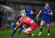 18 November 2023; Max Deegan of Leinster is tackled by Charlie Titcombe of Scarlets during the United Rugby Championship match between Leinster and Scarlets at the RDS Arena in Dublin. Photo by Harry Murphy/Sportsfile