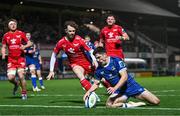 18 November 2023; Jimmy O'Brien of Leinster scores his side's second try despite the efforts of Tom Rogers of Scarlets during the United Rugby Championship match between Leinster and Scarlets at the RDS Arena in Dublin. Photo by Sam Barnes/Sportsfile