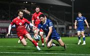 18 November 2023; Jimmy O'Brien of Leinster scores his side's second try despite the efforts of Tom Rogers of Scarlets  during the United Rugby Championship match between Leinster and Scarlets at the RDS Arena in Dublin. Photo by Sam Barnes/Sportsfile