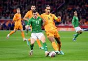 18 November 2023; Jason Knight of Republic of Ireland in action against Virgil van Dijk of Netherlands during the UEFA EURO 2024 Championship qualifying group B match between Netherlands and Republic of Ireland at Johan Cruijff ArenA in Amsterdam, Netherlands. Photo by Stephen McCarthy/Sportsfile