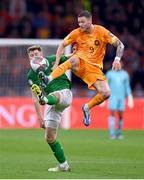 18 November 2023; Wout Weghorst of Netherlands in action against Nathan Collins of Republic of Ireland during the UEFA EURO 2024 Championship qualifying group B match between Netherlands and Republic of Ireland at Johan Cruijff ArenA in Amsterdam, Netherlands. Photo by Stephen McCarthy/Sportsfile