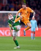 18 November 2023; Wout Weghorst of Netherlands in action against Nathan Collins of Republic of Ireland during the UEFA EURO 2024 Championship qualifying group B match between Netherlands and Republic of Ireland at Johan Cruijff ArenA in Amsterdam, Netherlands. Photo by Stephen McCarthy/Sportsfile