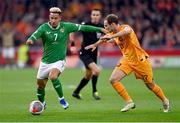 18 November 2023; Callum Robinson of Republic of Ireland in action against Daley Blind of Netherlands during the UEFA EURO 2024 Championship qualifying group B match between Netherlands and Republic of Ireland at Johan Cruijff ArenA in Amsterdam, Netherlands. Photo by Stephen McCarthy/Sportsfile