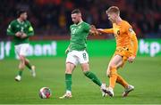 18 November 2023; Alan Browne of Republic of Ireland in action against Jerdy Schouten of Netherlands during the UEFA EURO 2024 Championship qualifying group B match between Netherlands and Republic of Ireland at Johan Cruijff ArenA in Amsterdam, Netherlands. Photo by Stephen McCarthy/Sportsfile