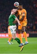 18 November 2023; Liam Scales of Republic of Ireland in action against Denzel Dumfries of Netherlands during the UEFA EURO 2024 Championship qualifying group B match between Netherlands and Republic of Ireland at Johan Cruijff ArenA in Amsterdam, Netherlands. Photo by Seb Daly/Sportsfile