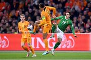 18 November 2023; Jamie McGrath of Republic of Ireland in action against Virgil van Dijk of Netherlands during the UEFA EURO 2024 Championship qualifying group B match between Netherlands and Republic of Ireland at Johan Cruijff ArenA in Amsterdam, Netherlands. Photo by Stephen McCarthy/Sportsfile