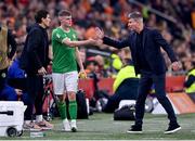 18 November 2023; Evan Ferguson of Republic of Ireland with Republic of Ireland manager Stephen Kenny after being substituted during the UEFA EURO 2024 Championship qualifying group B match between Netherlands and Republic of Ireland at Johan Cruijff ArenA in Amsterdam, Netherlands. Photo by Stephen McCarthy/Sportsfile