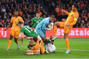 18 November 2023; Republic of Ireland goalkeeper Gavin Bazunu gathers possession of the ball under pressure from Virgil van Dijk of Netherlands during the UEFA EURO 2024 Championship qualifying group B match between Netherlands and Republic of Ireland at Johan Cruijff ArenA in Amsterdam, Netherlands. Photo by Seb Daly/Sportsfile
