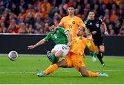 18 November 2023; Josh Cullen of Republic of Ireland is tackled by Virgil van Dijk of Netherlands during the UEFA EURO 2024 Championship qualifying group B match between Netherlands and Republic of Ireland at Johan Cruijff ArenA in Amsterdam, Netherlands. Photo by Stephen McCarthy/Sportsfile