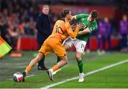 18 November 2023; Xavi Simons of Netherlands in action against Jayson Molumby of Republic of Ireland during the UEFA EURO 2024 Championship qualifying group B match between Netherlands and Republic of Ireland at Johan Cruijff ArenA in Amsterdam, Netherlands. Photo by Stephen McCarthy/Sportsfile