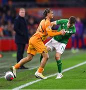 18 November 2023; Xavi Simons of Netherlands in action against Jayson Molumby of Republic of Ireland during the UEFA EURO 2024 Championship qualifying group B match between Netherlands and Republic of Ireland at Johan Cruijff ArenA in Amsterdam, Netherlands. Photo by Stephen McCarthy/Sportsfile