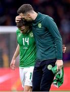 18 November 2023; Shane Duffy, right, consoles Republic of Ireland teammate Jayson Molumby after the UEFA EURO 2024 Championship qualifying group B match between Netherlands and Republic of Ireland at Johan Cruijff ArenA in Amsterdam, Netherlands. Photo by Stephen McCarthy/Sportsfile