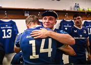 18 November 2023; Fintan Gunne of Leinster is embraced by teammate Jordan Larmour after making his debut in the United Rugby Championship match between Leinster and Scarlets at the RDS Arena in Dublin. Photo by Harry Murphy/Sportsfile