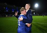 18 November 2023; Fintan Gunne of Leinster is embraced by teammate Sam Prendergast after making his debut in the United Rugby Championship match between Leinster and Scarlets at the RDS Arena in Dublin. Photo by Harry Murphy/Sportsfile