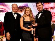 18 November 2023; Danielle Caldwell of Mayo is presented with her TG4 LGFA All Star award by Ard Stiúrthóir TG4 Alan Esslemont, left, and Uachtarán Cumann Peil Gael na mBan, Mícheál Naughton during the TG4 All-Ireland Ladies Football All Stars Awards banquet, in association with Lidl, at the Bonnington Dublin Hotel. Photo by Brendan Moran/Sportsfile