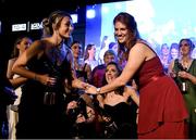 18 November 2023; Louise Ní Mhuircheartaigh of Kerry, right, is congratulated by Niamh Carmody of Kerry after winning the TG4 Senior Players Player of the Year award during the TG4 All-Ireland Ladies Football All Stars Awards banquet, in association with Lidl, at the Bonnington Dublin Hotel. Photo by Brendan Moran/Sportsfile