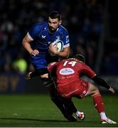 18 November 2023; Max Deegan of Leinster in action against Tomi Lewis of Scarlets during the United Rugby Championship match between Leinster and Scarlets at the RDS Arena in Dublin. Photo by Sam Barnes/Sportsfile