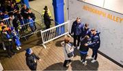 18 November 2023; Leinster players Jason Jenkins, Harry Byrne and Robbie Henshaw with supporters in Autograph Alley before the United Rugby Championship match between Leinster and Scarlets at the RDS Arena in Dublin. Photo by Sam Barnes/Sportsfile