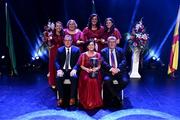 18 November 2023; Mainistir Chnoc Muaidhe of Galway, Norrie Quinn, Caroline Ward, Madeline Dolan, Olivia McNama and Orla Hession are presented with the cup by Teachtaireacht ó Chathaoirleach Chomhairle na Mumhan Gearóid Ó Riain and Teachtaireacht ó Chathaoirleach Choiste Náisiúnta Scór Tomás Ó Muirí after winning the Bailéad-Ghrúpa category during the Scór Sinsir 2023 All-Ireland Finals at the INEC Arena in Killarney, Kerry. Photo by Eóin Noonan/Sportsfile