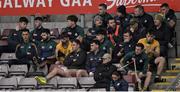 18 November 2023; Corofin goalkeeper Bernard Power who was replaced at half time sits in the stand with members of the team during the AIB Connacht GAA Football Senior Club Championship Semi-Final match between Corofin, Galway, and Ballina Stephenites, Mayo, at Pearse Stadium, Galway. Photo by Ray Ryan/Sportsfile