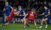 18 November 2023; Jamie Osborne of Leinster in action against Teddy Leatherbarrow, left, and Ben Williams of Scarlets during the United Rugby Championship match between Leinster and Scarlets at the RDS Arena in Dublin. Photo by Sam Barnes/Sportsfile