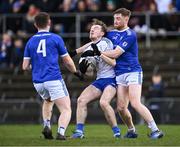 19 November 2023; Paddy McDermott of Naas in action against Oisin Hogan, left, and Enda Gaffney of St Loman's Mulligar during the AIB Leinster GAA Football Senior Club Championship Semi-Final match between St Loman's Mullingar, Mullingar, and Naas, Kildare, at TEG Cusack Park in Mullingar, Westmeath. Photo by Piaras Ó Mídheach/Sportsfile