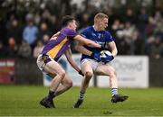 19 November 2023; Páraic McKenny of Ardee St Mary’s in action against Dara Mullin of Kilmacud Crokes during the AIB Leinster GAA Football Senior Club Championship Semi-Final match between Ardee St Mary's, Louth, and Kilmacud Crokes, Dublin, at Pairc Mhuire in Ardee, Louth. Photo by Daire Brennan/Sportsfile