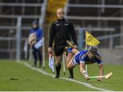 19 November 2023; Alan Flynn of Kiladangan tries to prevent a sideline during the AIB Munster GAA Hurling Senior Club Championship Semi-Final match between Kiladangan, Tipperary, and Clonlara, Clare, at FBD Semple Stadium in Thurles, Tipperary. Photo by Stephen Marken/Sportsfile