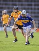 19 November 2023; Paul Flynn of Kiladangan in action against Jathan McMahon of Clonlara during the AIB Munster GAA Hurling Senior Club Championship Semi-Final match between Kiladangan, Tipperary, and Clonlara, Clare, at FBD Semple Stadium in Thurles, Tipperary. Photo by Stephen Marken/Sportsfile