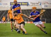 19 November 2023; Logan Ryan of Clonlara in action against Andy Loughnane of Kiladangan during the AIB Munster GAA Hurling Senior Club Championship Semi-Final match between Kiladangan, Tipperary, and Clonlara, Clare, at FBD Semple Stadium in Thurles, Tipperary. Photo by Stephen Marken/Sportsfile