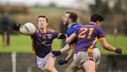 19 November 2023; Éimhín Keenan of Ardee St Mary’s in action against Hugh Kenny, left, and Darragh Dempsey of Kilmacud Crokes during the AIB Leinster GAA Football Senior Club Championship Semi-Final match between Ardee St Mary's, Louth, and Kilmacud Crokes, Dublin, at Pairc Mhuire in Ardee, Louth. Photo by Daire Brennan/Sportsfile