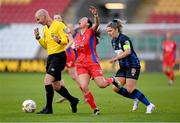 19 November 2023; Referee Marc Lynch impedes the attack of Megan Smyth-Lynch of Shelbourne as she is tracked by Laurie Ryan of Athlone Town during the Sports Direct FAI Women's Cup Final match between Athlone Town and Shelbourne at Tallaght Stadium in Dublin. Photo by Stephen McCarthy/Sportsfile