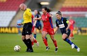 19 November 2023; Referee Marc Lynch impedes the attack of Megan Smyth-Lynch of Shelbourne as she is tracked by Laurie Ryan of Athlone Town during the Sports Direct FAI Women's Cup Final match between Athlone Town and Shelbourne at Tallaght Stadium in Dublin. Photo by Stephen McCarthy/Sportsfile