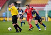 19 November 2023; Referee Marc Lynch impedes the attack of Megan Smyth-Lynch of Shelbourne as she is tracked by Laurie Ryan of Athlone Town during the Sports Direct FAI Women's Cup Final match between Athlone Town and Shelbourne at Tallaght Stadium in Dublin. Photo by Stephen McCarthy/Sportsfile