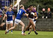 19 November 2023; Craig Dias of Kilmacud Crokes in action against Shane Matthews of Ardee St Mary’s during the AIB Leinster GAA Football Senior Club Championship Semi-Final match between Ardee St Mary's, Louth, and Kilmacud Crokes, Dublin, at Pairc Mhuire in Ardee, Louth. Photo by Daire Brennan/Sportsfile