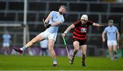 19 November 2023; Kevin Downes of Na Piarsaigh is hooked by Mikey Mahony of Ballygunner during the AIB Munster GAA Hurling Senior Club Championship Semi-Final match between Na Piarsaigh, Limerick, and Ballygunner, Waterford, at TUS Gaelic Grounds in Limerick. Photo by Brendan Moran/Sportsfile