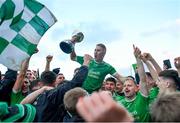 19 November 2023; Cathal Moriarty of Milltown-Castlemaine celebrates with team mates and the trophy after the Kerry County Intermediate Football Championship Final match between Fossa and Milltown/Castlemaine at Austin Stack Park in Tralee, Kerry. Photo by David Fitzgerald/Sportsfile
