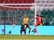 19 November 2023; Jemma Quinn of Shelbourne shoots to score her side's first goal past Athlone Town goalkeeper Katie Keane during the Sports Direct FAI Women's Cup Final match between Athlone Town and Shelbourne at Tallaght Stadium in Dublin. Photo by Stephen McCarthy/Sportsfile