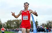 19 November 2023; Kevin Mulcaire of Ennis Track AC, Clare, celebrates on his way to finishing second place in the Mens Senior 9000m during the 123.ie National Senior & Even Age Cross Country Championships at Gowran Demesne in Kilkenny. Photo by Ben McShane/Sportsfile